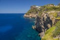 Cliffs coastline with calm deep blue sea