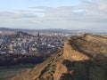 Cliffs with Edinburgh in background Royalty Free Stock Photo