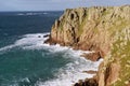 The cliffs and Longships Lighthouse Lands End Cornwall, UK