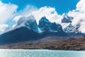 The cliffs of Los Cuernos by the lake Royalty Free Stock Photo