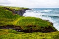 Cliffs of Moher at the Alantic Ocean in Western Ireland with waves battering against the rocks Royalty Free Stock Photo