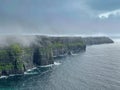 The Cliffs of Moher sea cliffs Ireland with sea cave Royalty Free Stock Photo