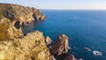 Cliffs over the Atlantic ocean. The westernmost point in Europe. The edge of the land. Cape Roca or Cabo da Roca, Portugal Royalty Free Stock Photo