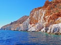 The cliffs and rock formations of Polyaigos, an island of the Greek Cyclades Royalty Free Stock Photo