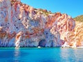 The cliffs and rock formations of Polyaigos, an island of the Greek Cyclades Royalty Free Stock Photo