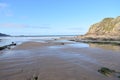 Sea scape of a deserted beach when the tide has not long gone out. Royalty Free Stock Photo