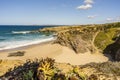 Cliffs and sand on Cerca Nova Beach, Alentejo, Portugal Royalty Free Stock Photo