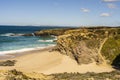 Cliffs and sand on Cerca Nova Beach, Alentejo, Portugal Royalty Free Stock Photo