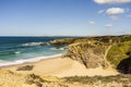 Cliffs and sand on Cerca Nova Beach, Alentejo, Portugal Royalty Free Stock Photo