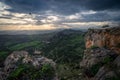 Cliffs at sunset with flying vulture