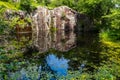 Cliffs and Tranquil Pond at Quarry Park Royalty Free Stock Photo