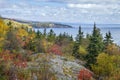 Cliffs and trees in fall color along Lake Superior in the fall Royalty Free Stock Photo
