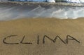 clima written in sand at the seaside Royalty Free Stock Photo