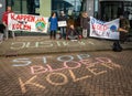 Climate activists during protest against coal mining in front of the Havengebouw building in Amsterdam