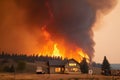 climate change-driven wildfire destroys forest, smoke visible from miles away