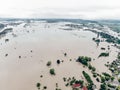 Climate change and the effects of global warming. Flooded village, farms and fields after heavy rains