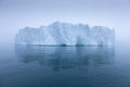 Climate change and global warming. Icebergs from a melting glacier in Greenland. UNESCO