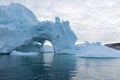 Climate change and global warming. Icebergs from a melting glacier in Greenland. UNESCO