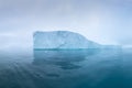 Climate change and global warming. Icebergs from a melting glacier in Greenland. UNESCO