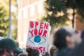 Climate Change protest sign - open your eyes