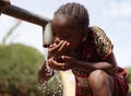 Climate Change Symbol, Cute African Little Woman with Water