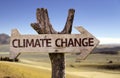 Climate Change wooden sign with a desert background