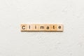 climate word written on wood block. climate text on cement table for your desing, concept Royalty Free Stock Photo