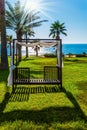 Climatic cabin in a palm grove Royalty Free Stock Photo