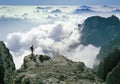 Climber admiring breathtaking mountain panorama Royalty Free Stock Photo