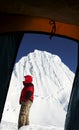 Climber and Alpamayo peak from the tent