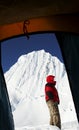 Climber and Alpamayo peak from the tent