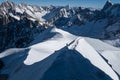 Climber ascending arete in way up to Aiguille du Midi Royalty Free Stock Photo