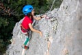 climber boy. the child trains in rock climbing Royalty Free Stock Photo