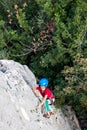 climber boy. the child trains in rock climbing