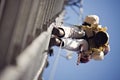 Climber on cell tower Royalty Free Stock Photo