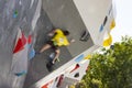 Climber. Climbing wall. Young male competitor in the Madrid Block Climbing Spain Cup held at Madrid`s. Climbers. Olympic sport. Royalty Free Stock Photo