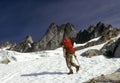 Climber crossing snowfield