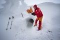 Climber digs a snow cave