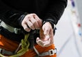 Climber dressing equipment Royalty Free Stock Photo