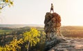 Climber on the edge of a cliff sandstone