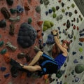 Climber flagging packed wall