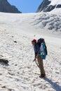 Climber girl hiking in mountains