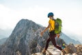 climber goes along the rocky ridge. girl climbing in the mountains. Turkey. the concept of adventure and hiking in the mountains