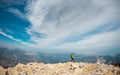 climber goes along the rocky ridge. girl climbing in the mountains. Turkey. the concept of adventure and hiking in the mountains