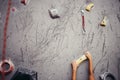 Climber hands holding artificial boulder in climbing gym, closeup shot Royalty Free Stock Photo