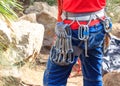 Climber harness with hanging express belt