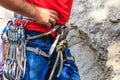 Climber harness with hanging express belt