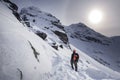 Climber hiking on the mountain in winter. Tatra Mountains with KoÃâºcielec peak.