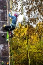 Climber with ice axes climbing on artificial climbing drytooling wall on the Drytool World Cup in Brno Royalty Free Stock Photo