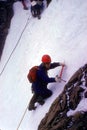 Climber on ice headwall of glacier